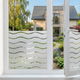 Isolierende und sonnenbeständige statische Fensterfolie HR++ - Blendschutz - Wellen 